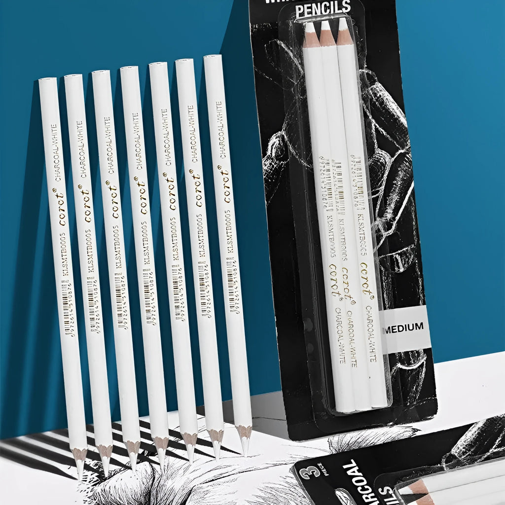 Three white charcoal pencils for sketching on dark paper with highlighting effect