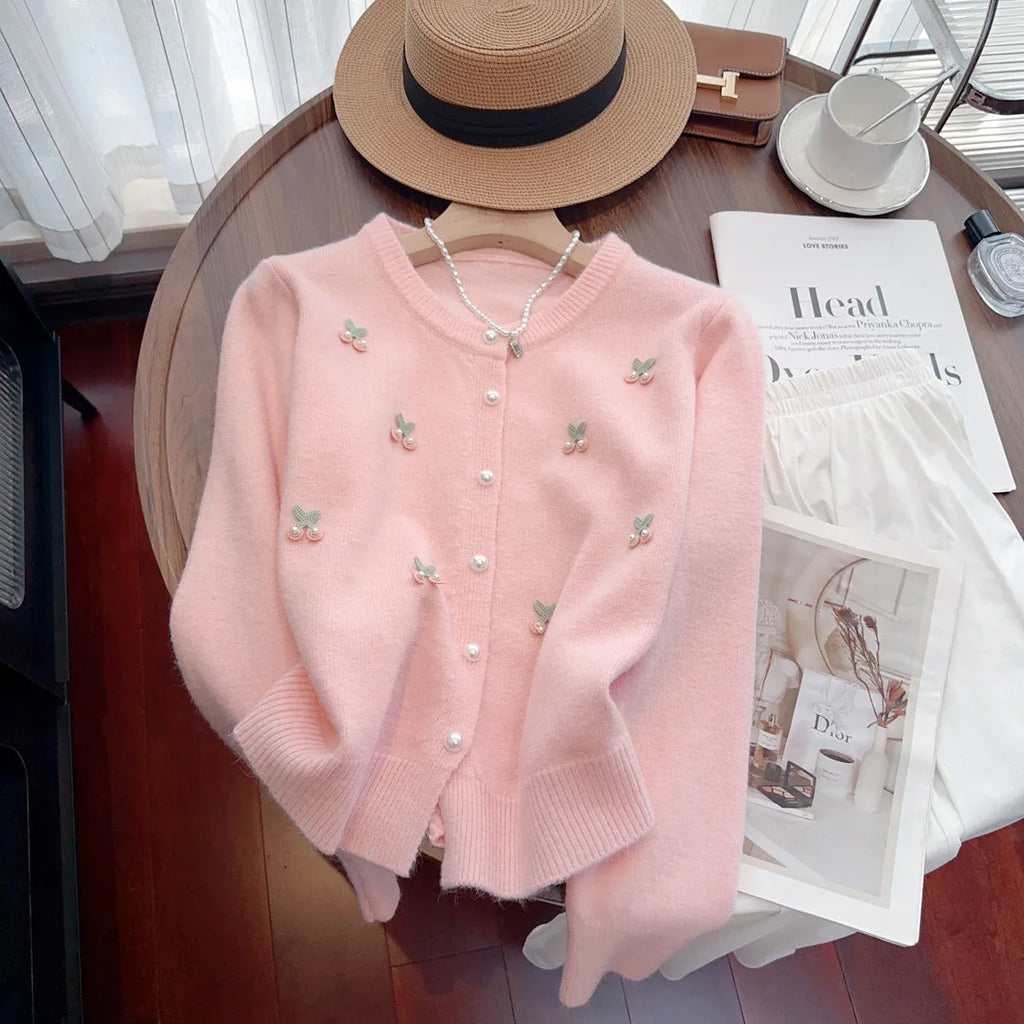 Women's slim fit beaded cardigan coat in cashmere blend, shown in blue, pink, red, and white colour options.