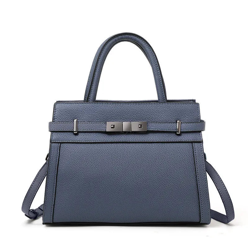 Genuine leather clamshell crossbody handbag for women with multiple internal compartments in five colour options.