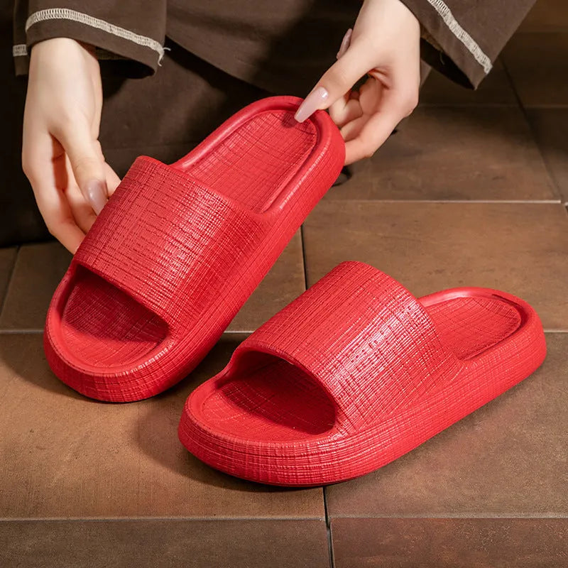 Unisex adult EVA flip flop slippers with toe ring and non-slip sole in multiple colours.