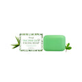 A 100g bar of tea tree oil cleansing soap with aloe and mint leaves.