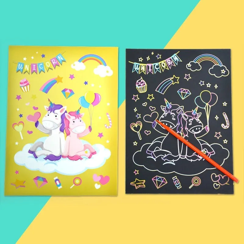 DIY graffiti scraping painting paper kit with scratch tool, showing colourful animal theme artwork revealed on black paper