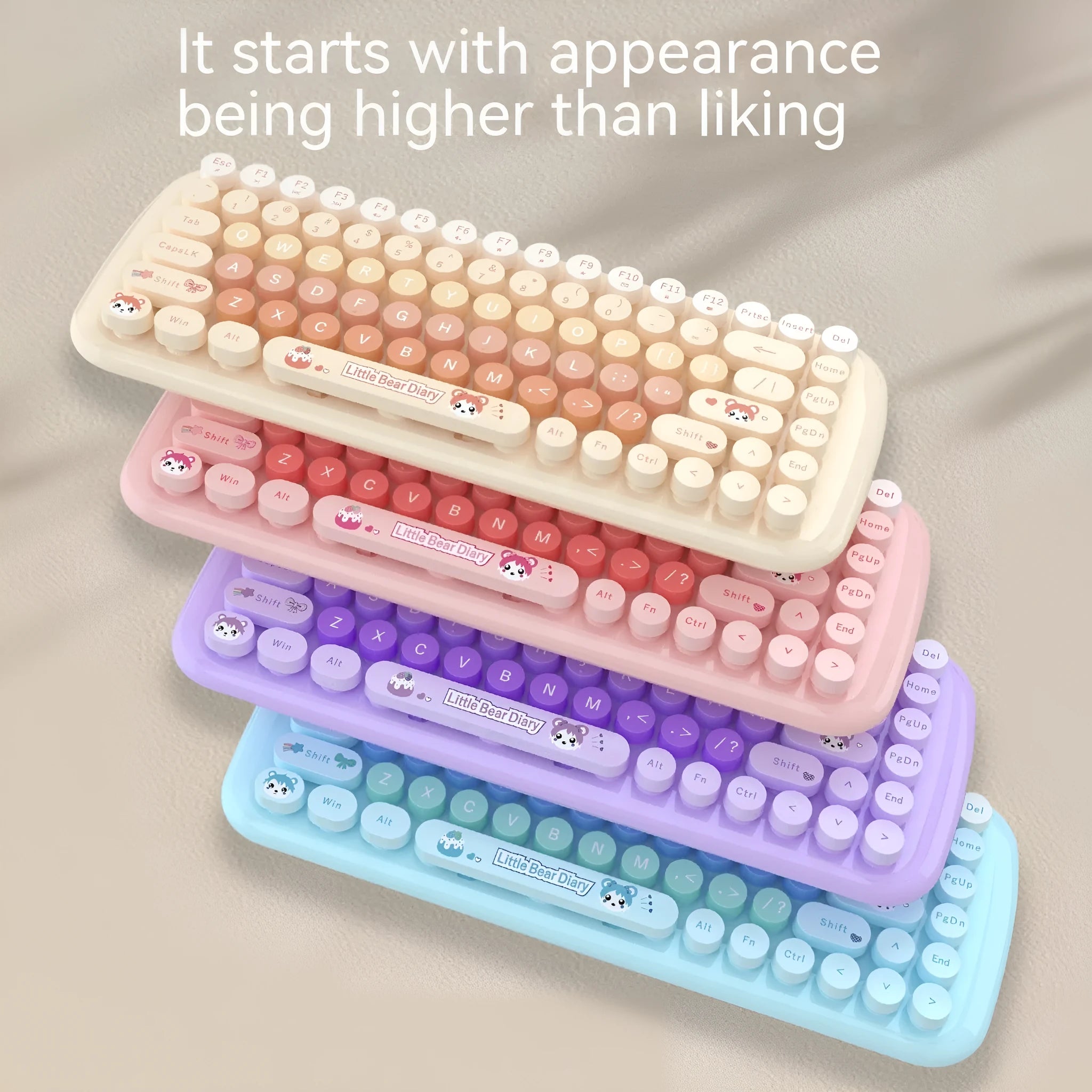 Candy pink compact wireless keyboard and mouse set with USB receiver on a desk