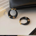Hong Kong style retro ear studs with rhinestone inlay dripping oil treatment alloy metal earrings