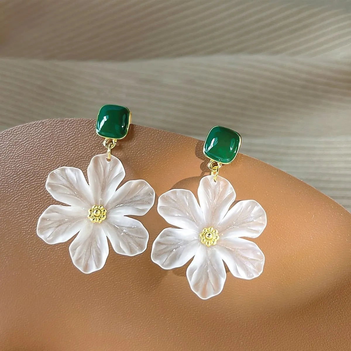 Dark green sweet earrings with needle flowers design, alloy material.