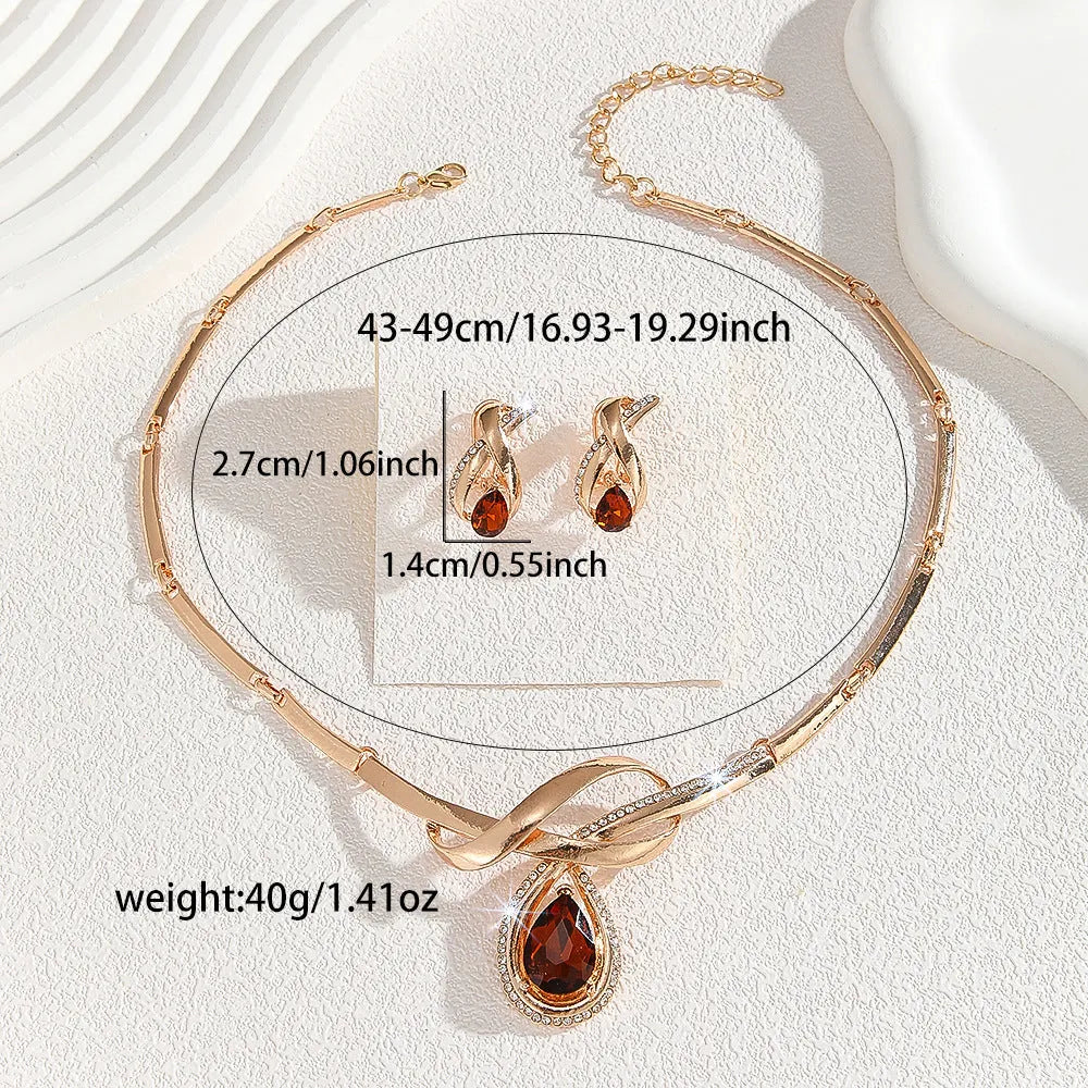 Gold alloy necklace and earrings set with white rhinestone and brown crystal inlay, V-shaped pendant, fishtail fan design