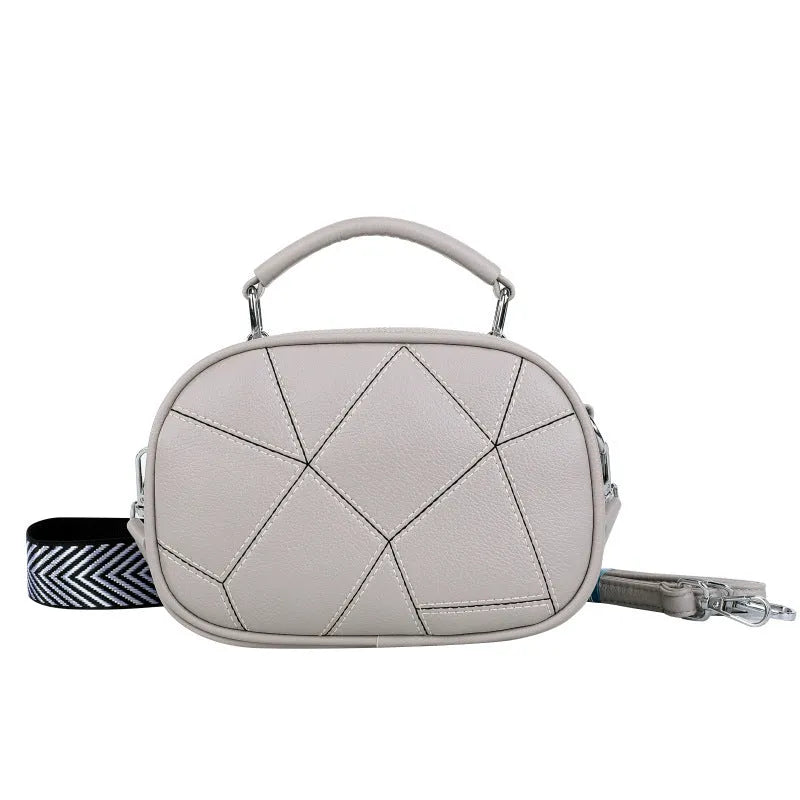 Round women's PU leather patchwork small bag with three-layer design and stitching detail