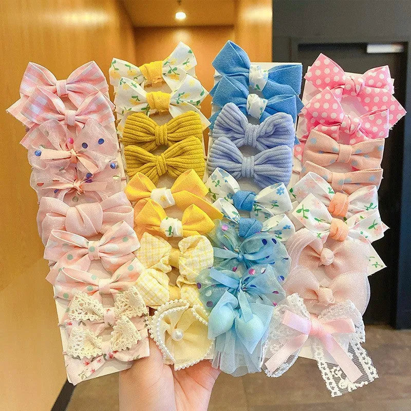Fabric hair bow set for children with bow flower pattern in multiple colours