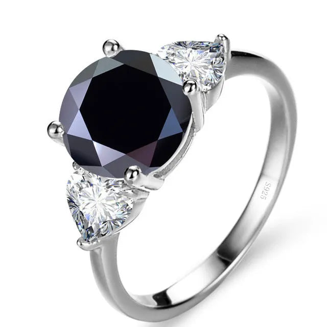 Sterling silver ring with 10mm round 3 karat moissanite stone in white colour on white background