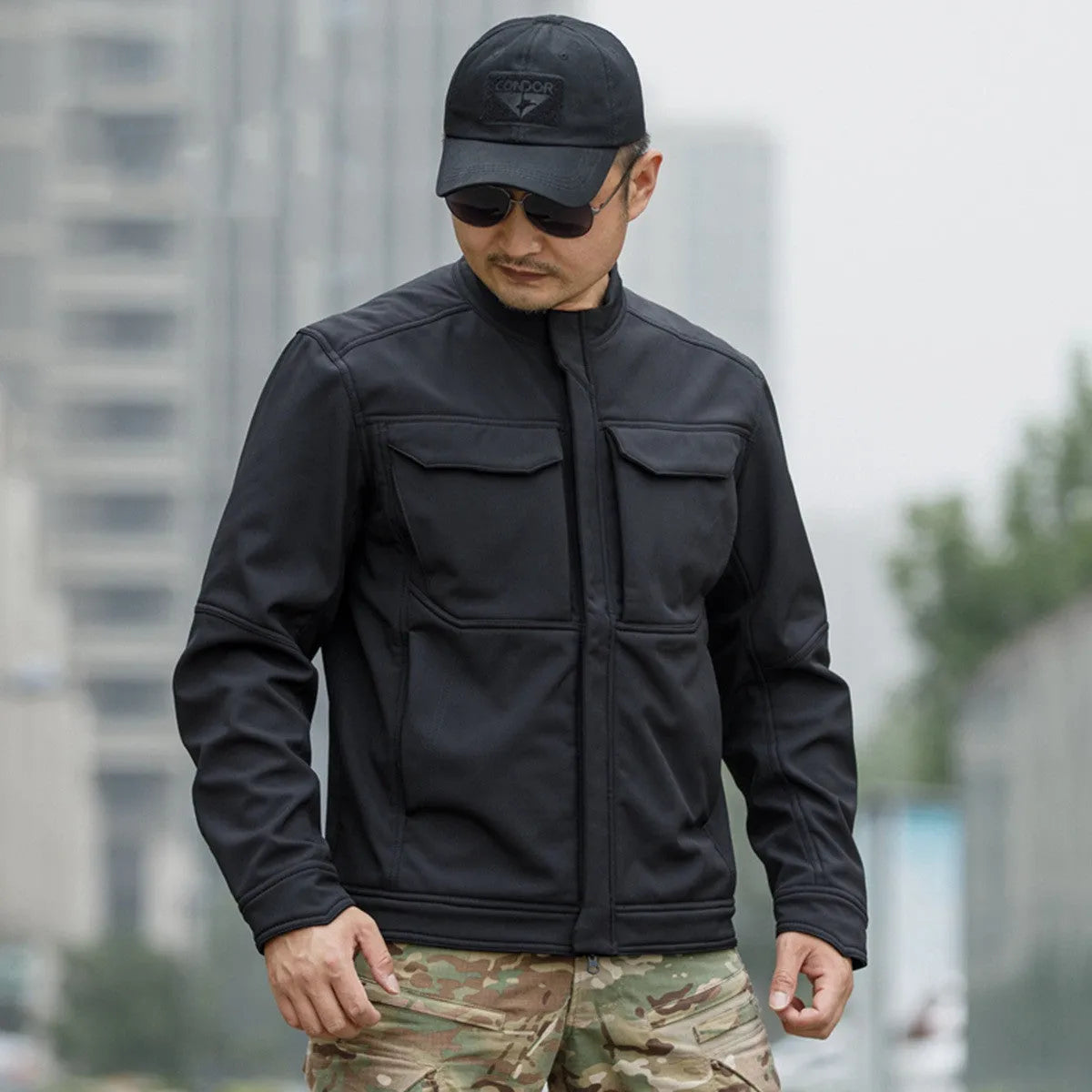 Bone Frog Peak Breaker soft shell tactical jacket in black camouflage colour for mountaineering.