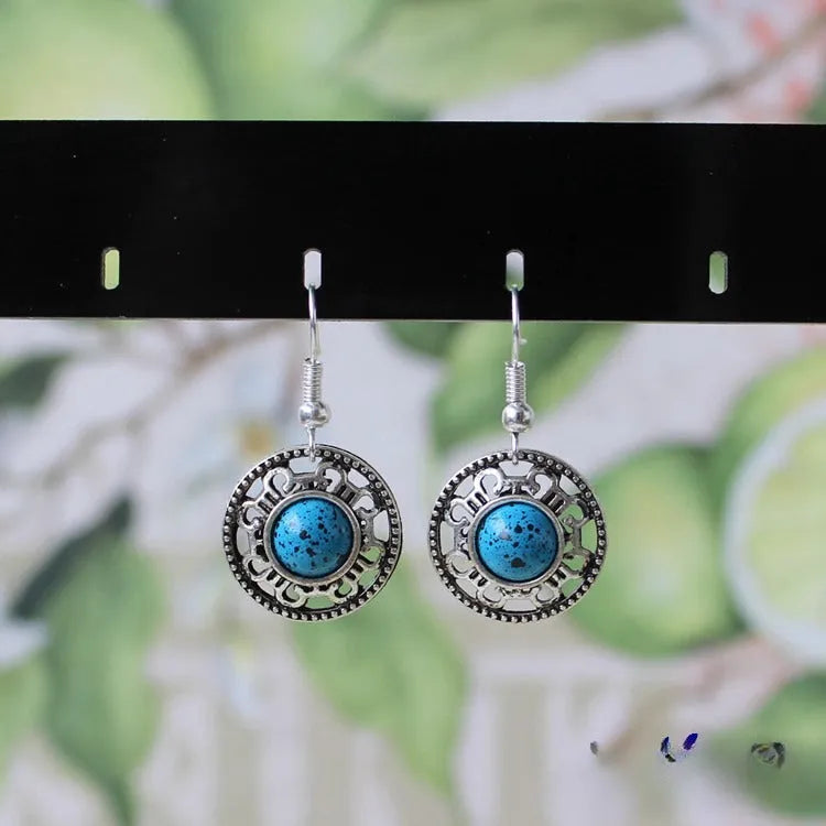 Miao silver retro turquoise flower disk earrings with geometric design in red, blue, and black colours