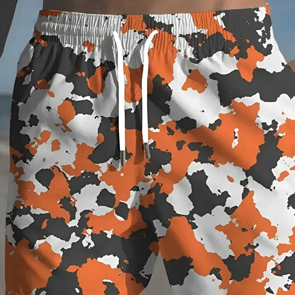 Men's polyester beach shorts with printed streetwear design and elastic waistband
