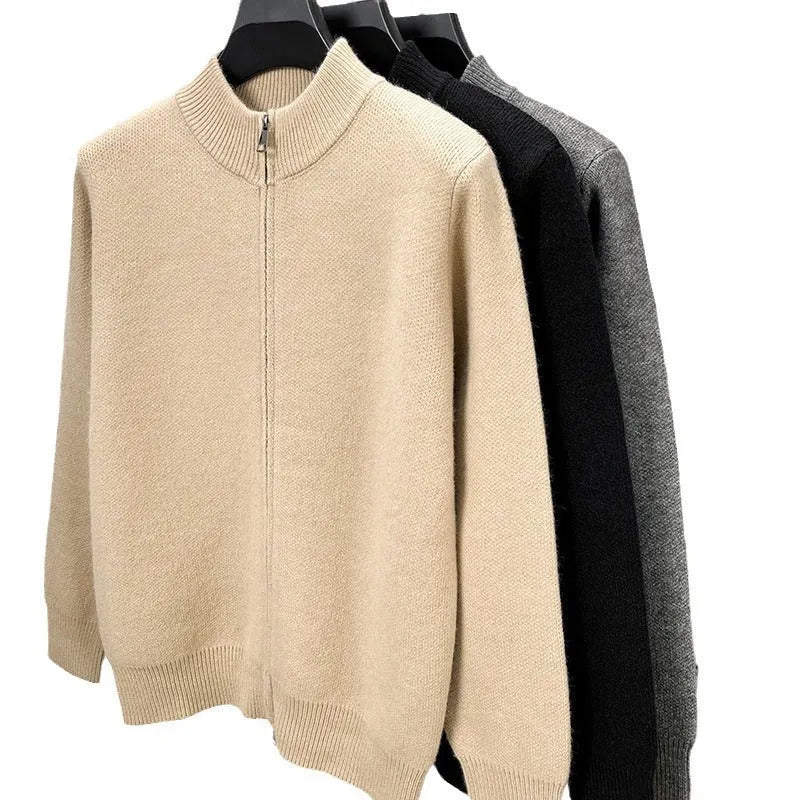 Men's black knitted cardigan with a stand collar and full-length front zipper, shown in a loose fit.