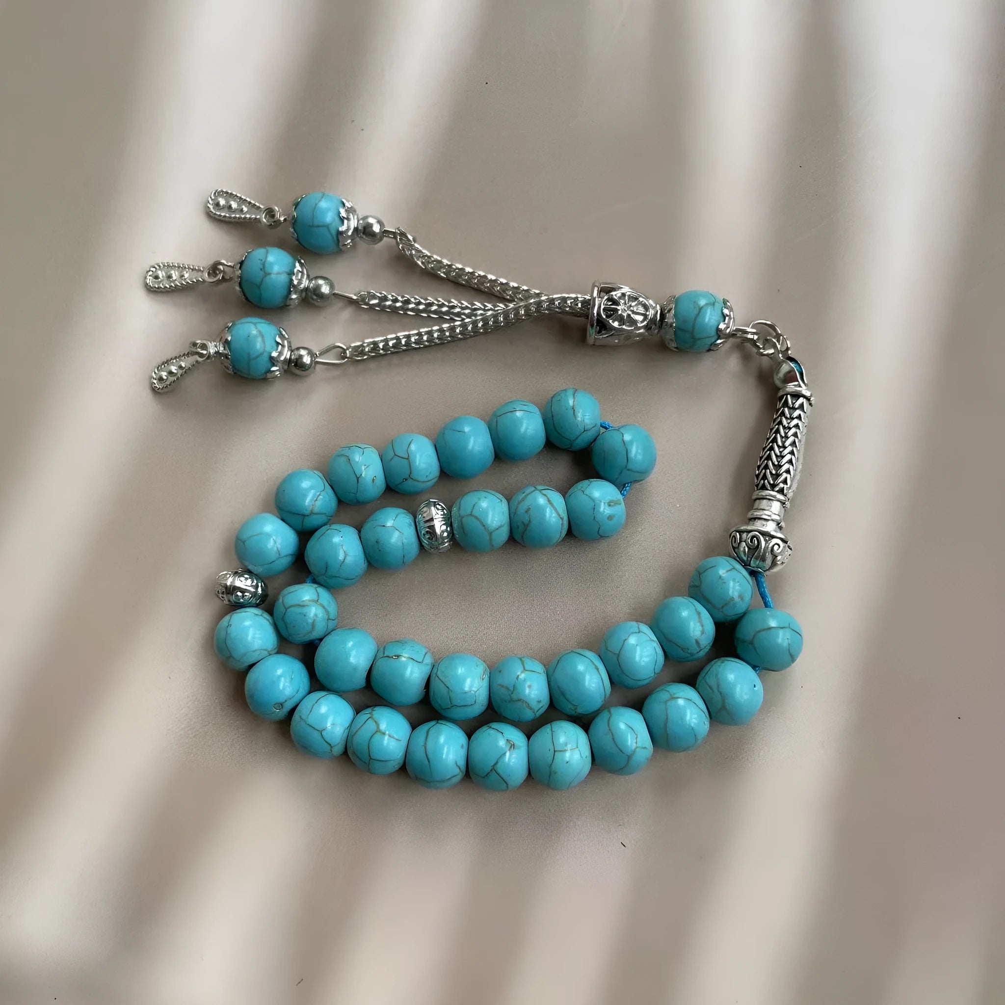 Sky blue Muslim prayer bracelet with 8mm stone beads on adjustable cord