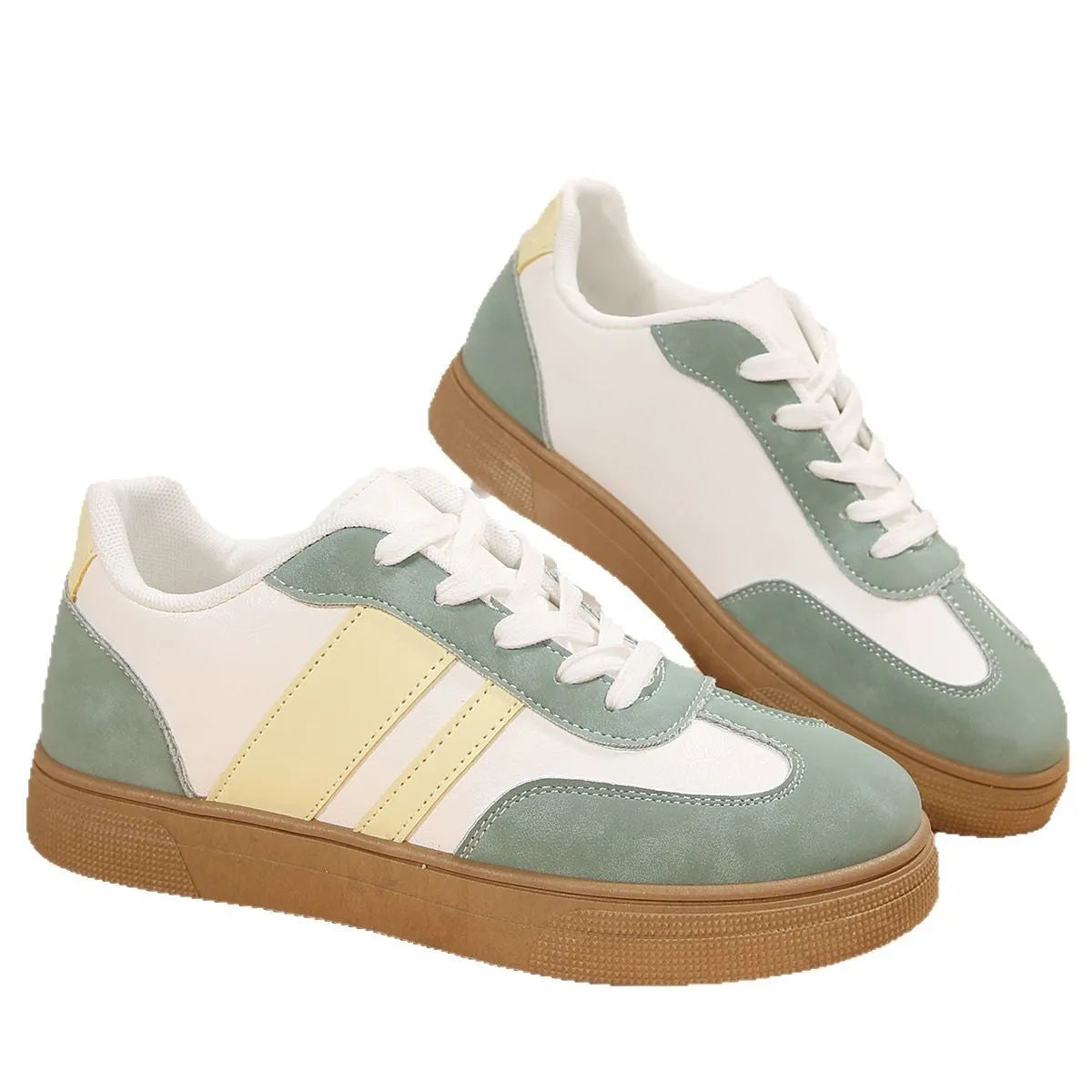 Green women's retro casual pumps with cross straps, low heel, and round toe.