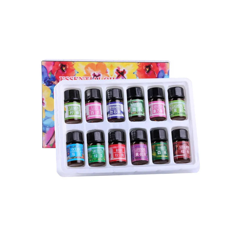 Set of 12 water-soluble humidifier essential oils in 3ML bottles with assorted fragrances including rose, lavender, and lemon