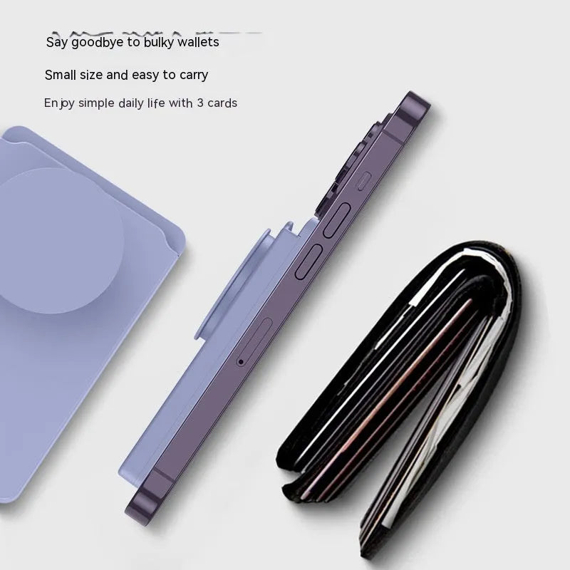 Minimalist black magnetic suction phone holder for iPhone on an office desk.