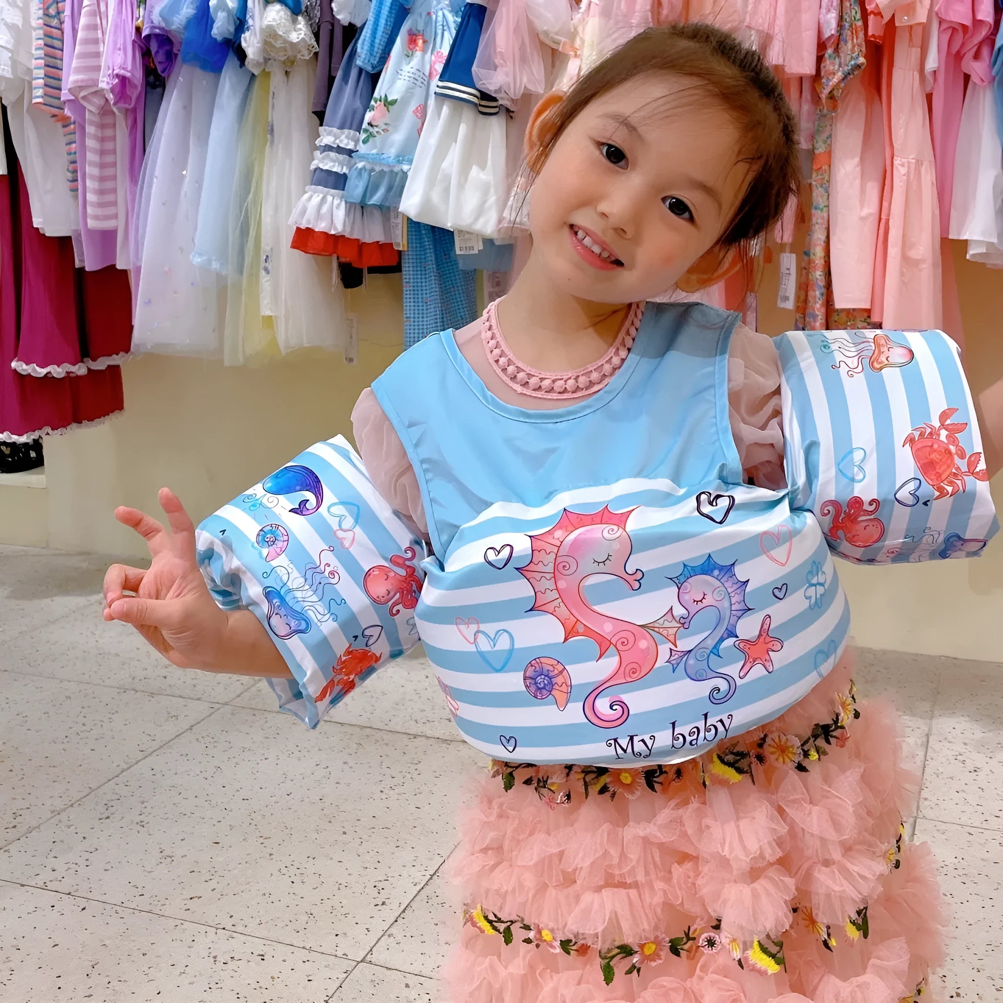 Children's cartoon swimsuit with integrated inflatable arm bands in watermelon pineapple design