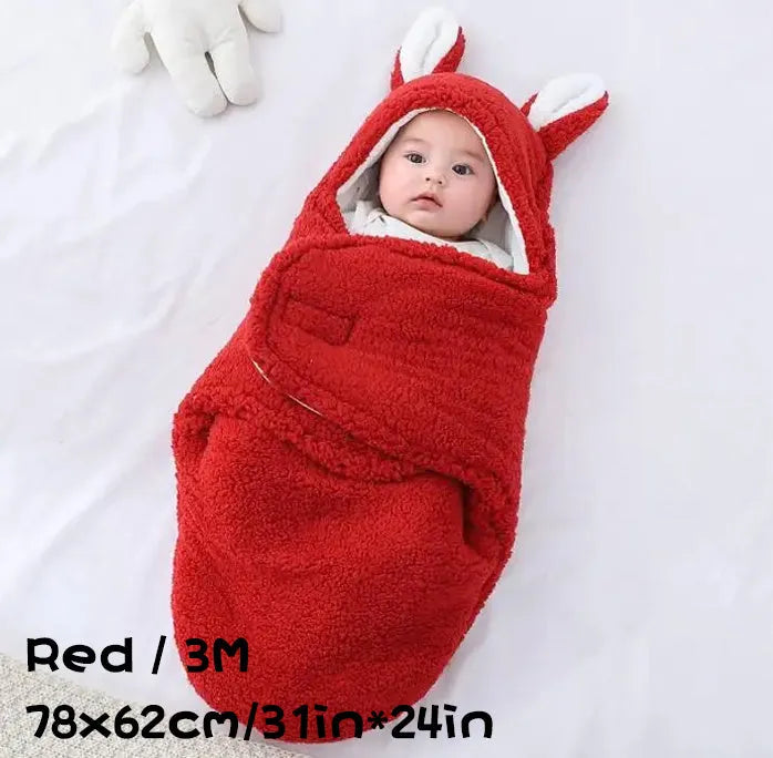 Adjustable baby sleeping bag swaddle blanket showing velcro wings and leg positioner in blue colour