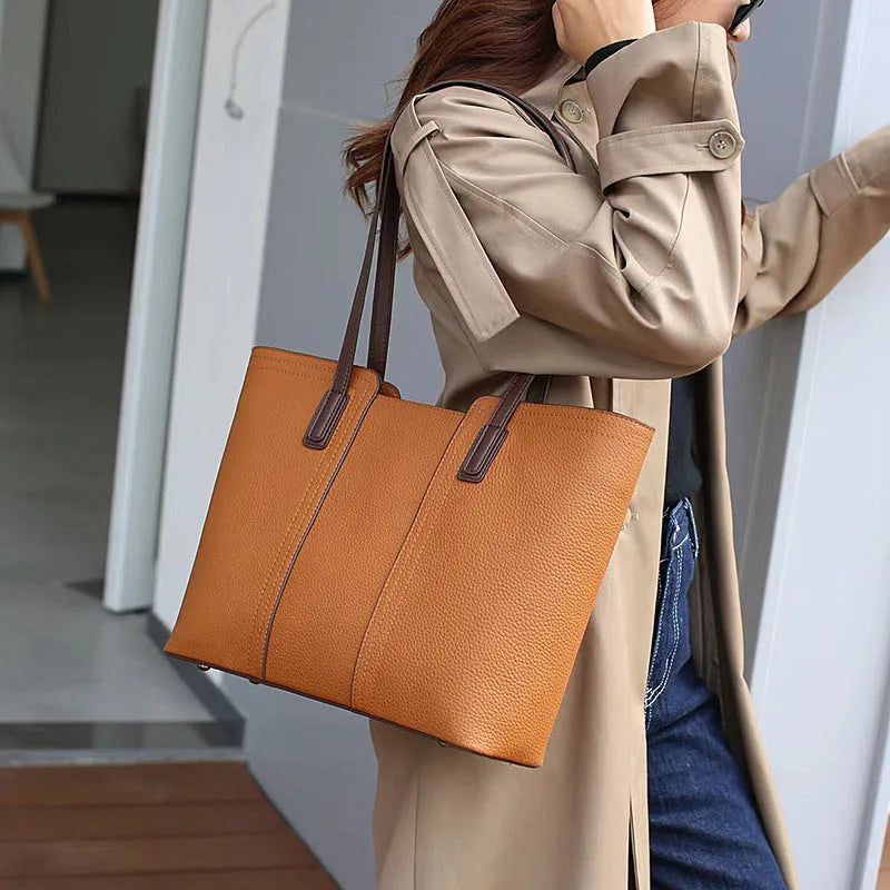 Women's genuine leather crossbody bag with horizontal square design and multiple interior compartments in black colour