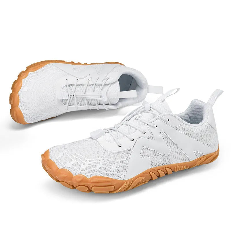 A pair of white and grey couple sports climbing shoes with Flyknit lining on a neutral background.