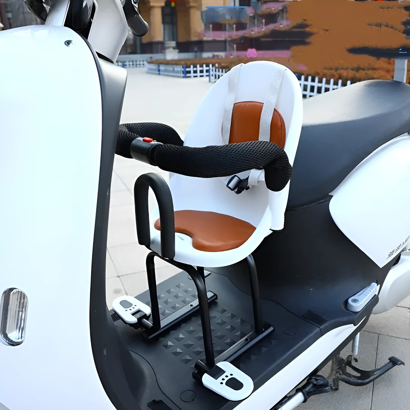 Front seat for children attached to a baby battery scooter, shown in black, red, and white colour options.