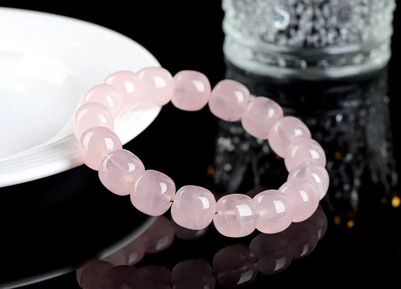 Pink crystal barrel bead bracelet with 11-12mm geometric beads and unisex design
