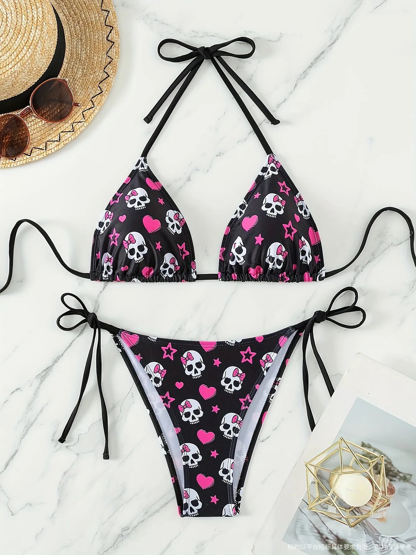 Spider web print backless triangle bikini top with adjustable straps and matching shorts.