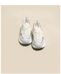Women's grey and pink low-top retro sneaker with round toe and flat rubber sole