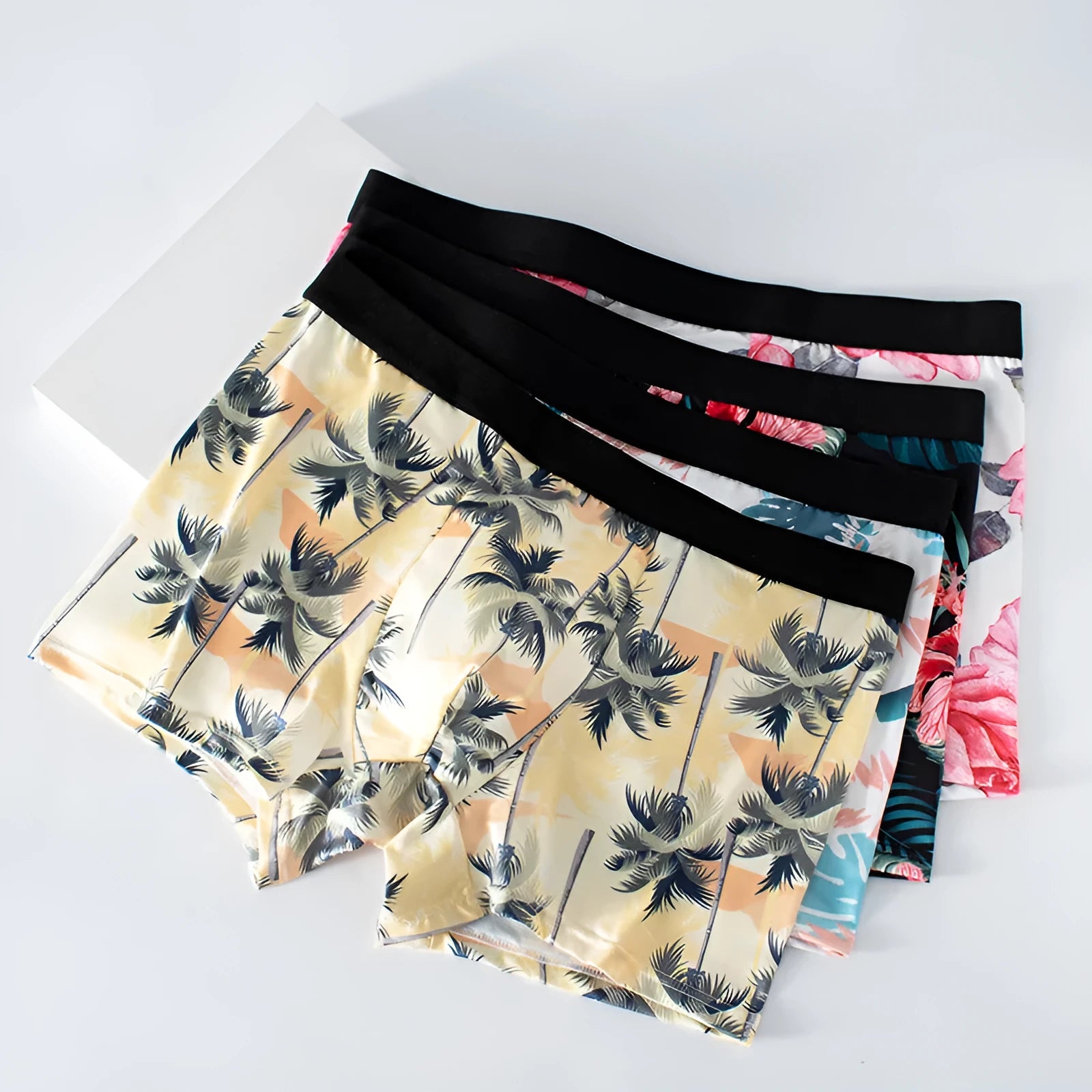 Men's Ice Silk printed underwear in floral design showing mid waist fit.