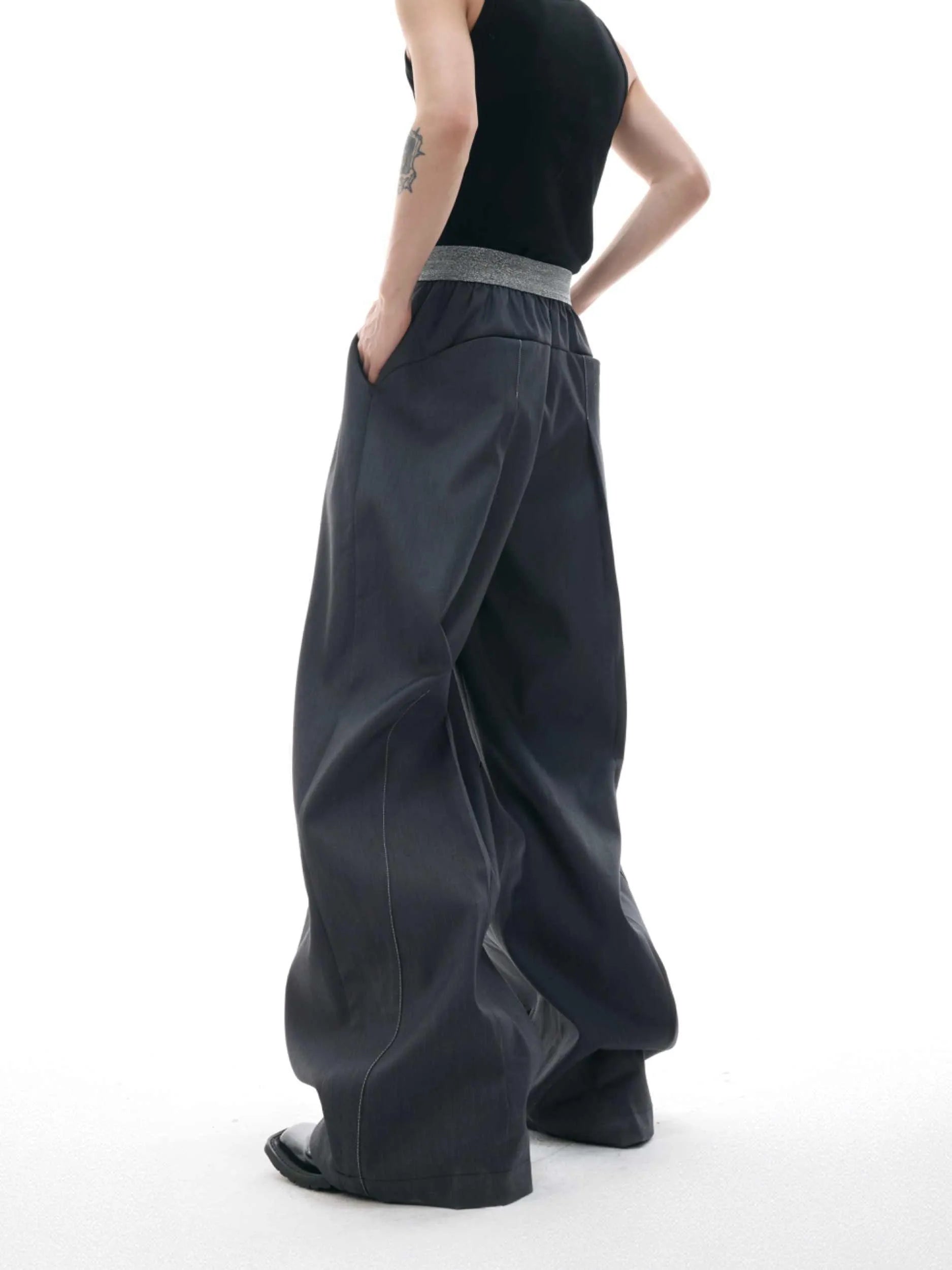 Straight-leg high-waisted casual trousers with button open line detail in black and grey colours