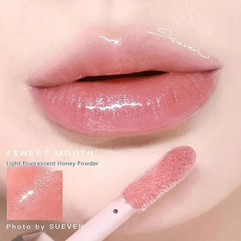 Mirror Water Light Highlight Lip Lacquer in streamer shade with glossy finish and applicator wand