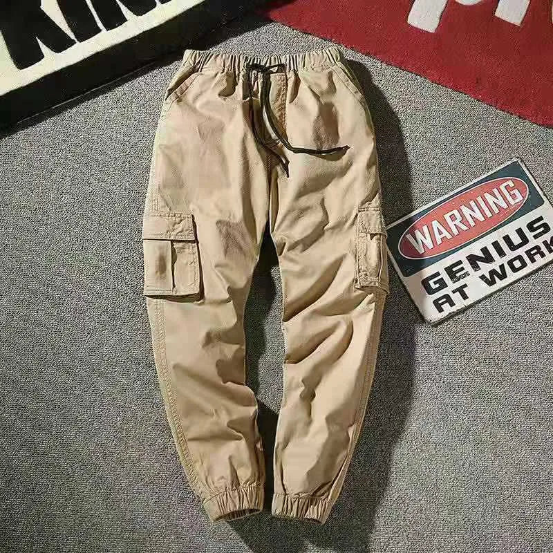 Men's loose-legged cotton casual trousers in camouflage and solid colours, sizes S to 7XL.
