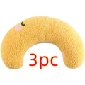 Blue U-shaped plush pet pillow for a small cat or dog on a grey background.