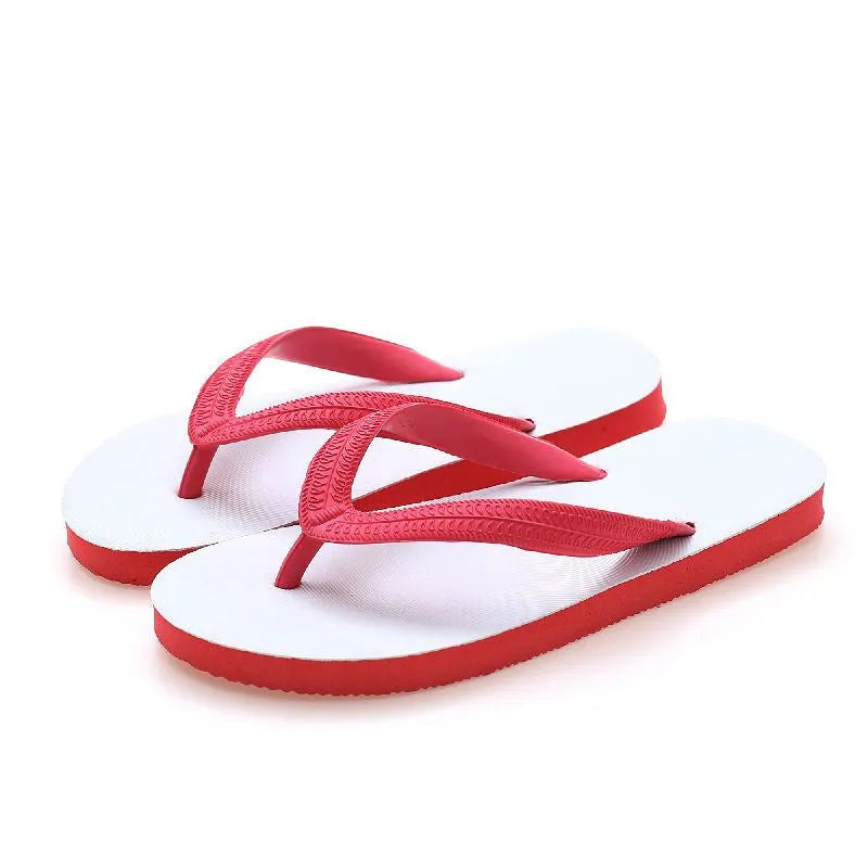 Rubber beach flip-flops with fish label in green, red, blue, or black, showing non-slip patterned sole.