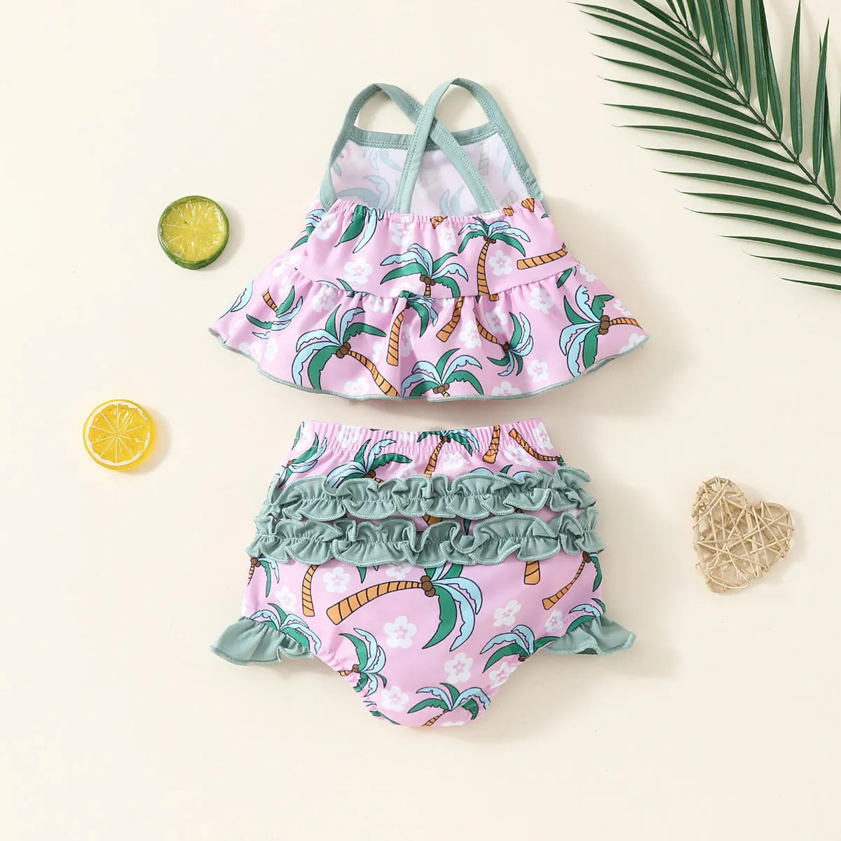 White children's two-piece swimsuit set with shirt and beach shorts for toddlers.