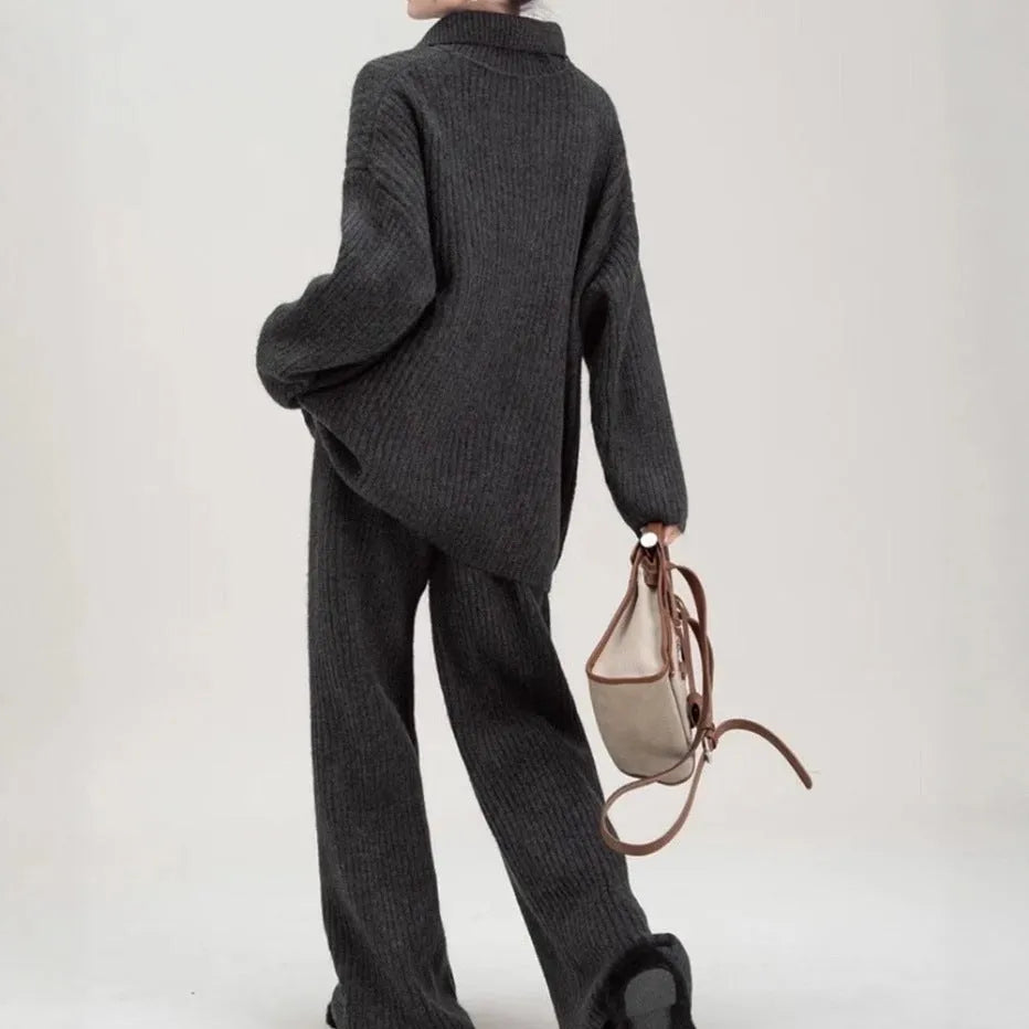 Acrylic knit sweater suit two-piece set showing top and trousers in beige colour