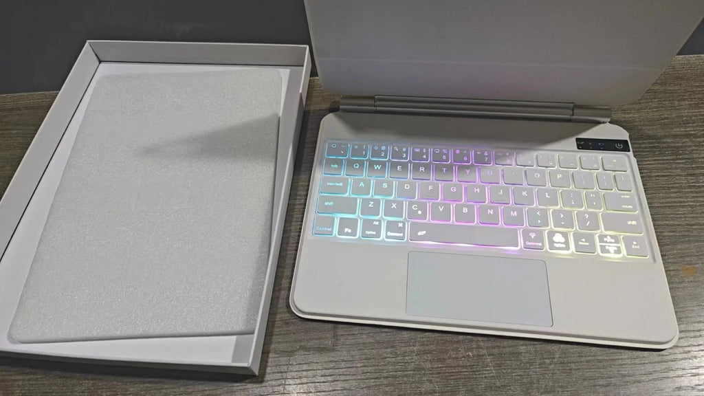 11-inch magnetic Bluetooth keyboard case for iPad in black, white, pink, purple, and blue colour options.