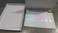 11-inch magnetic Bluetooth keyboard case for iPad in black, white, pink, purple, and blue colour options.