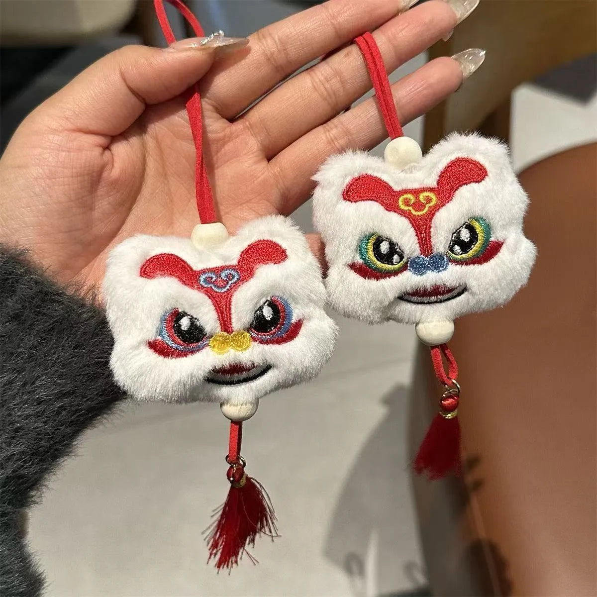 Handmade Chinese style plush lion tassel ornament keychain with star stone details in blue colour
