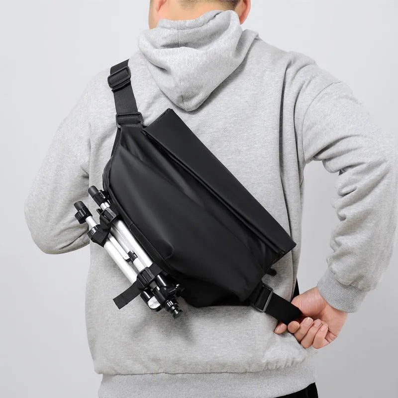 Men's medium crossbody shoulder bag in black or grey PU leather with internal organisation compartments