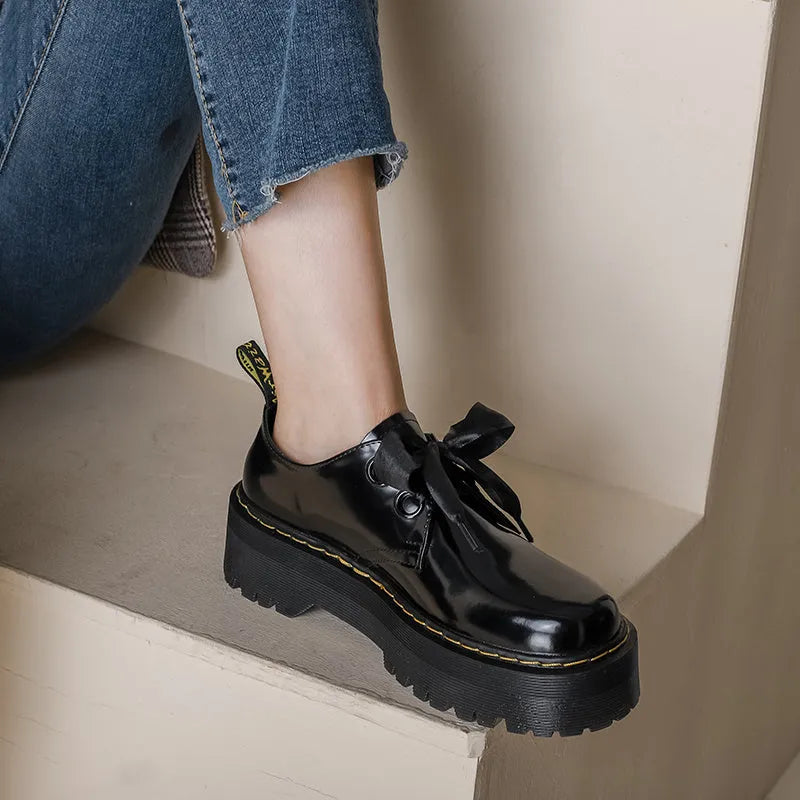 Women's black thick-soled shoes with ribbon laces and cross-strap design on superfine fibre upper
