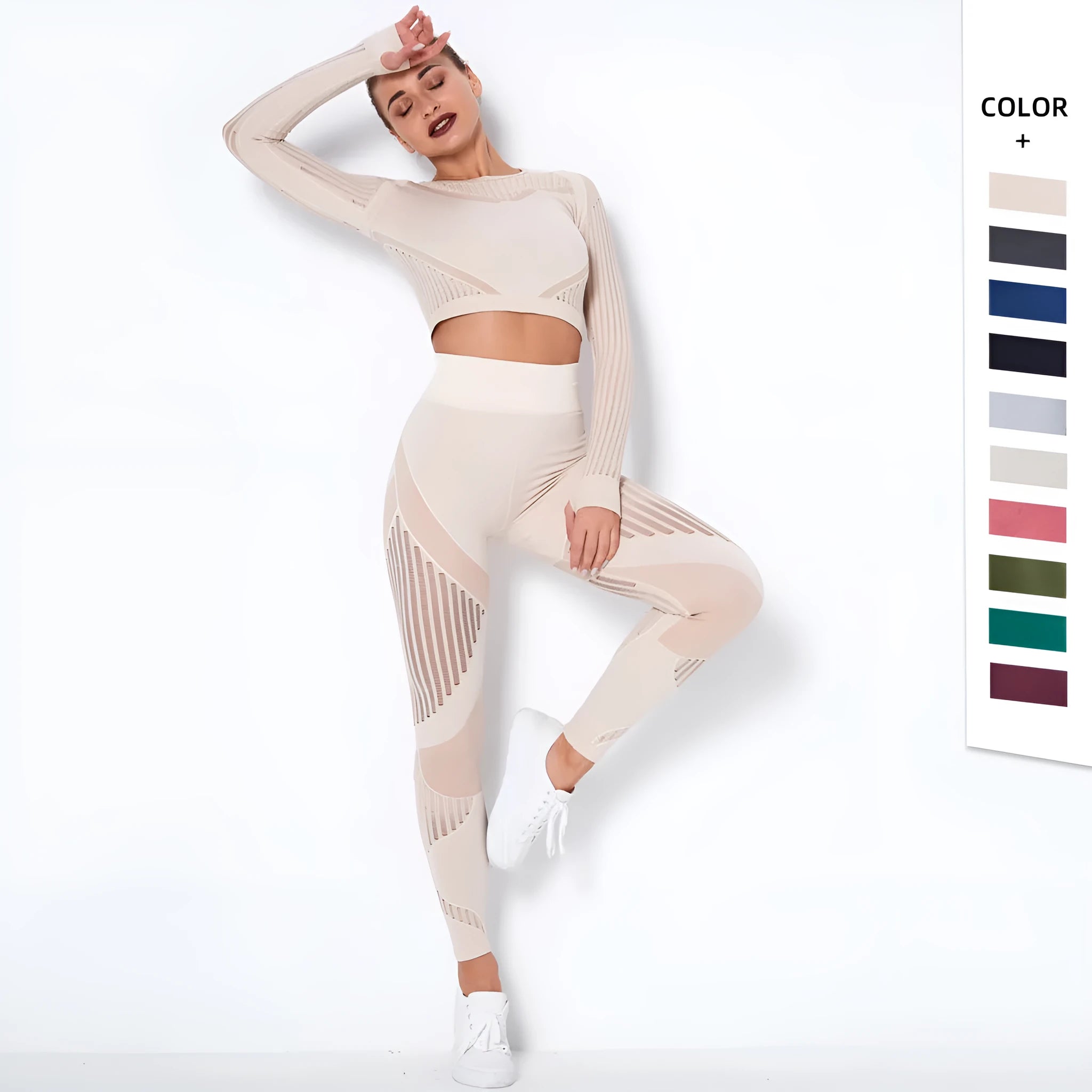 Woman wearing a seamless long-sleeved yoga suit in a neutral colour, demonstrating a stretch pose.