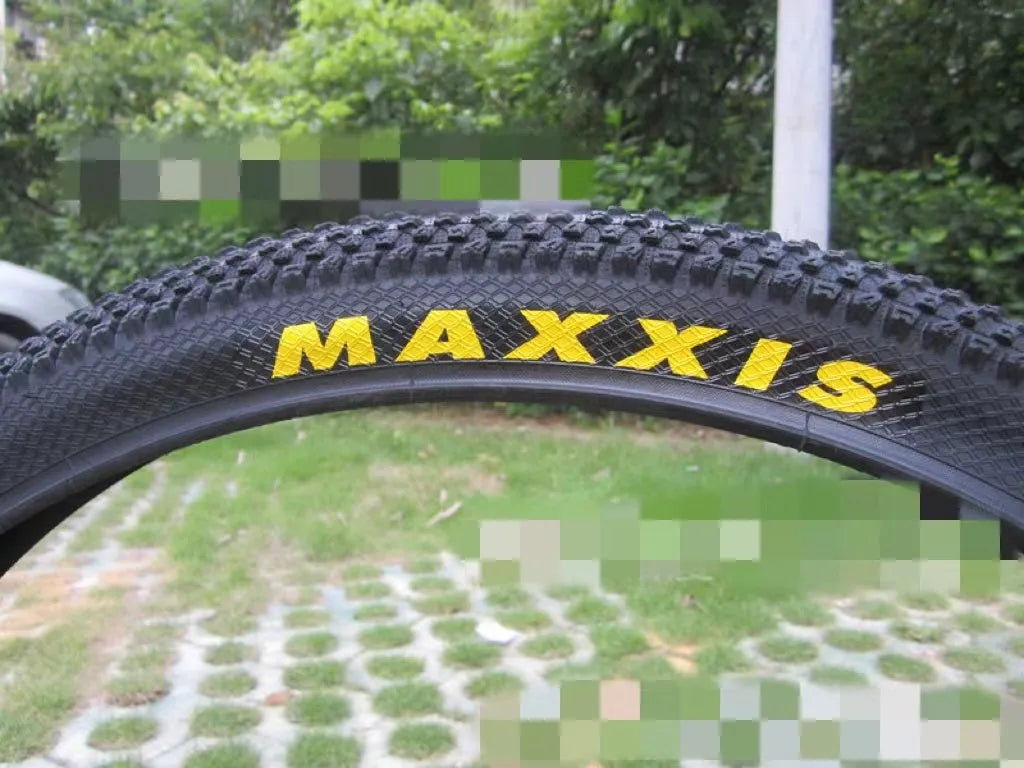 Mountain bike ultralight puncture-proof tyre showing tread pattern and white-label sidewall variant.