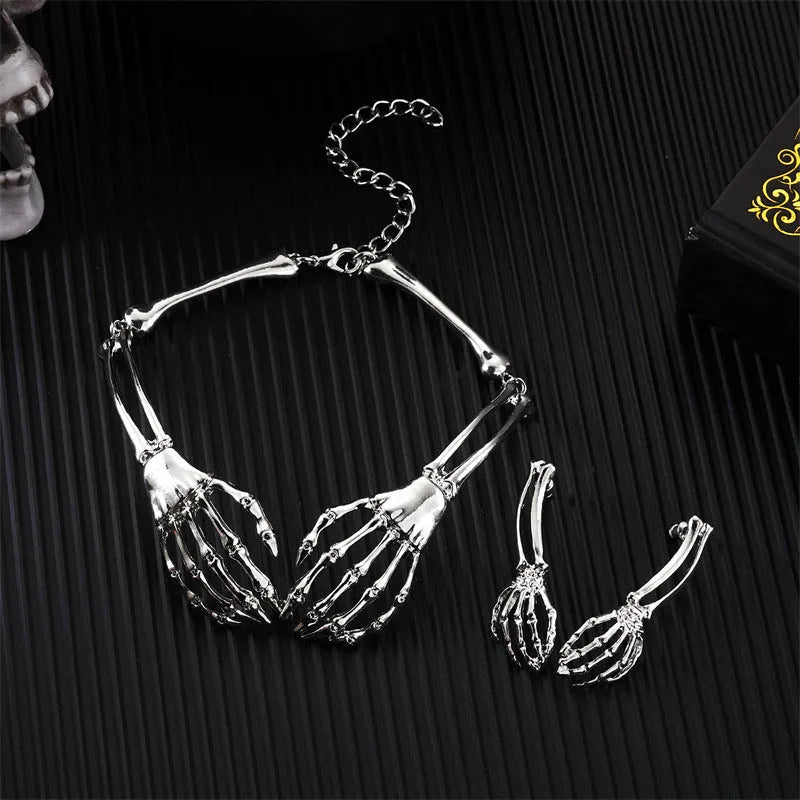Dark style alloy skull and ghost claw necklace and earrings set for women with electroplated finish