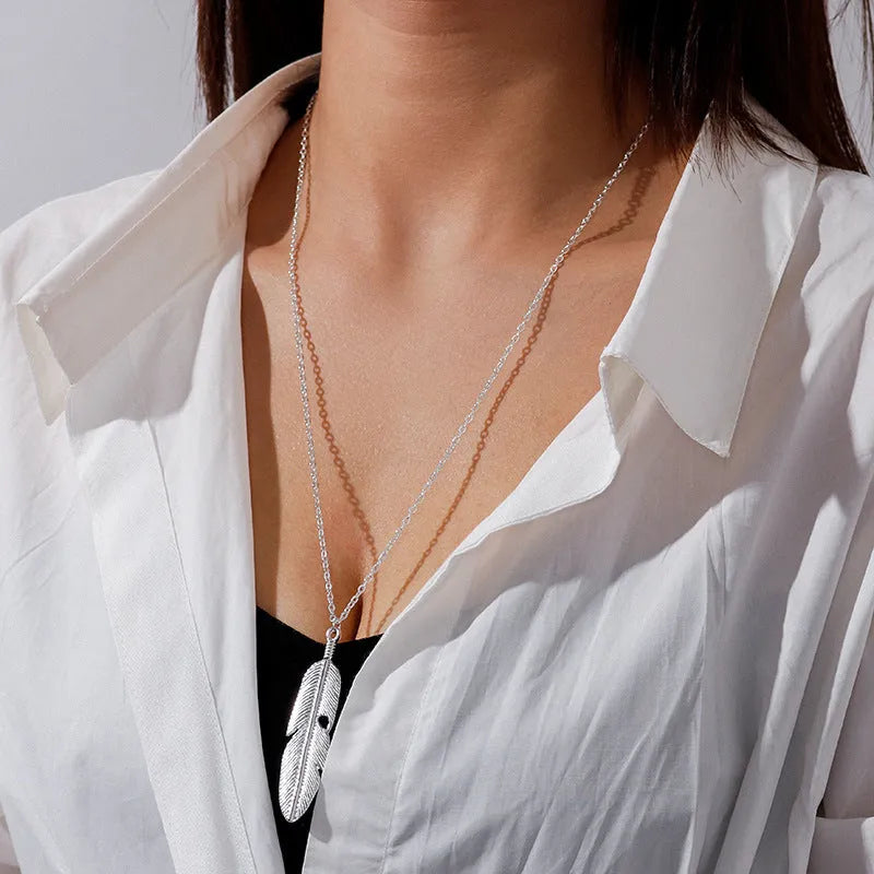 Retro feather tassel necklace for women in gold silver alloy with leaf geometry