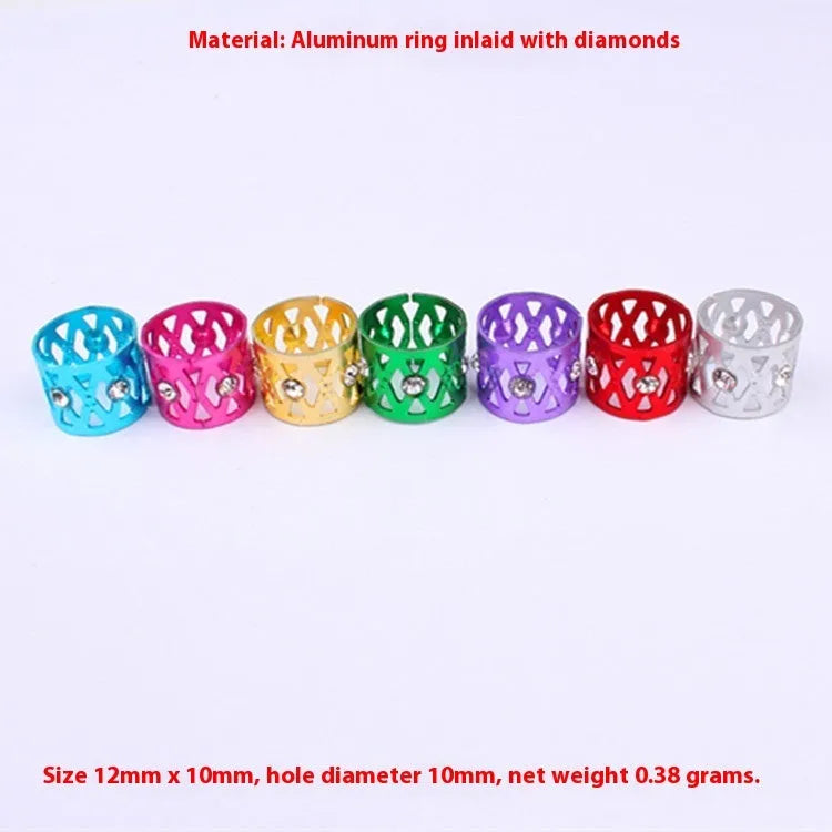 Hollow metal hair ring with jewel decoration shown in one of its eight colour options.