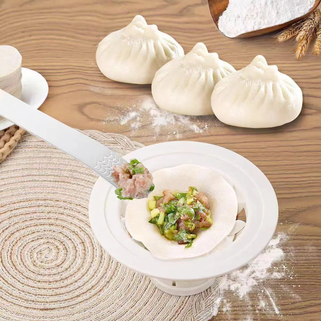 Set of four black plastic steamed bun molds for making dumplings and shaomai