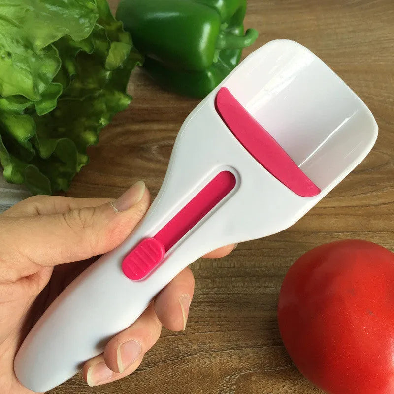 Photo-colour cake batter scoop with push lever on handle, 19.5 cm long, on white background