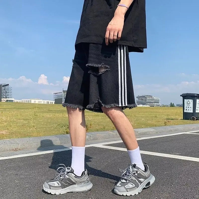 Men's black ripped denim shorts, loose fit, retro three-bar design, fifth length, cotton, sizes S to 3XL.